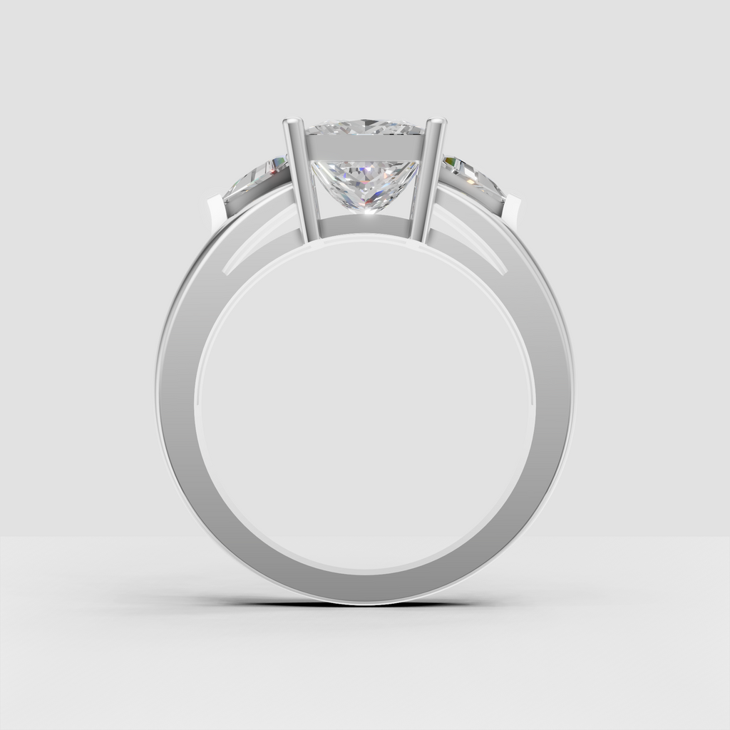 Three stone yellow gold engagement ring with princess center stone