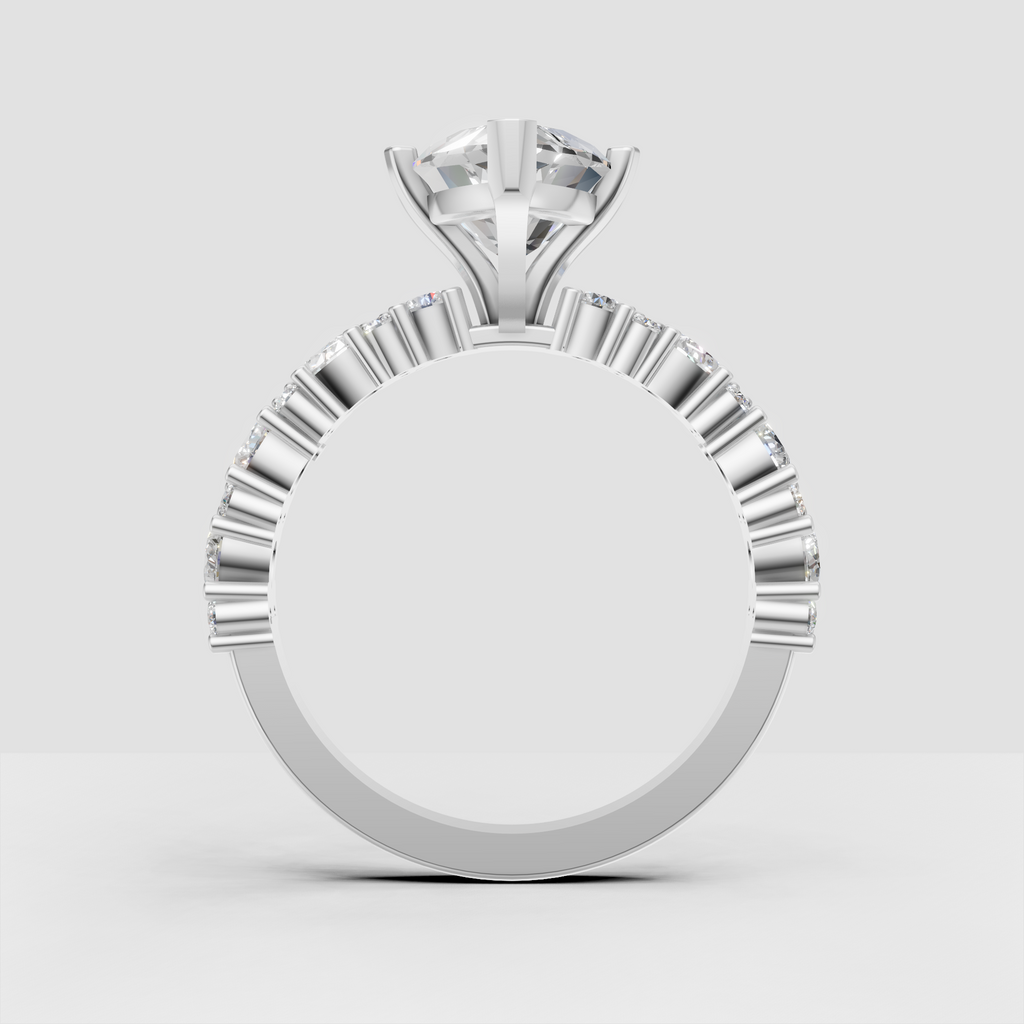 Marquise cut diamond ring with symmetrical shoulder stones