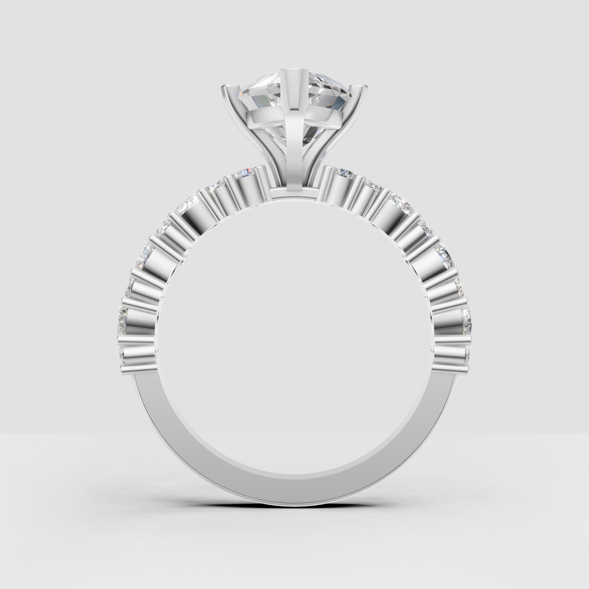 Marquise cut diamond ring with symmetrical shoulder stones