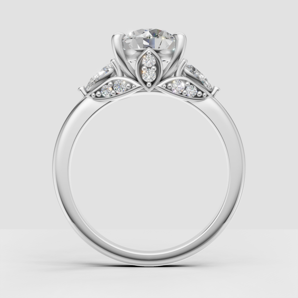 Ornate yellow gold engagement ring with round diamond side stones