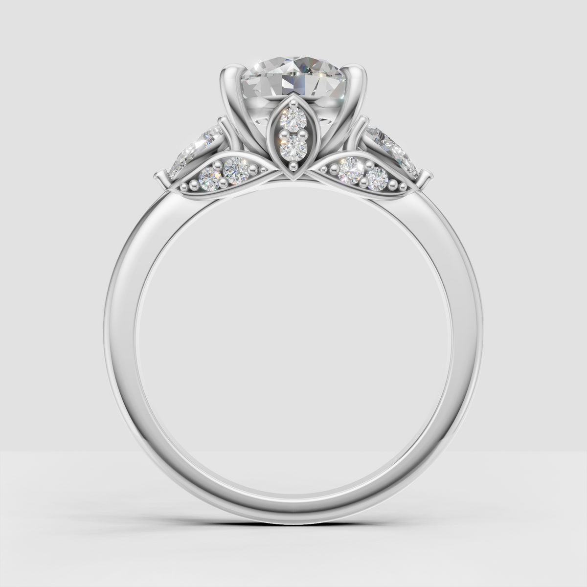 Ornate yellow gold engagement ring with round diamond side stones