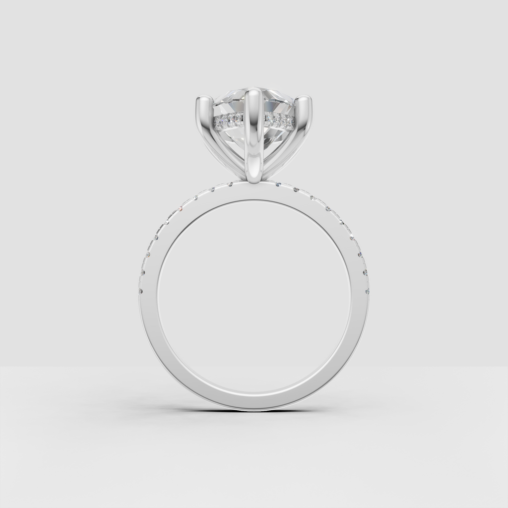 Marquise cut engagement ring with polished gold band