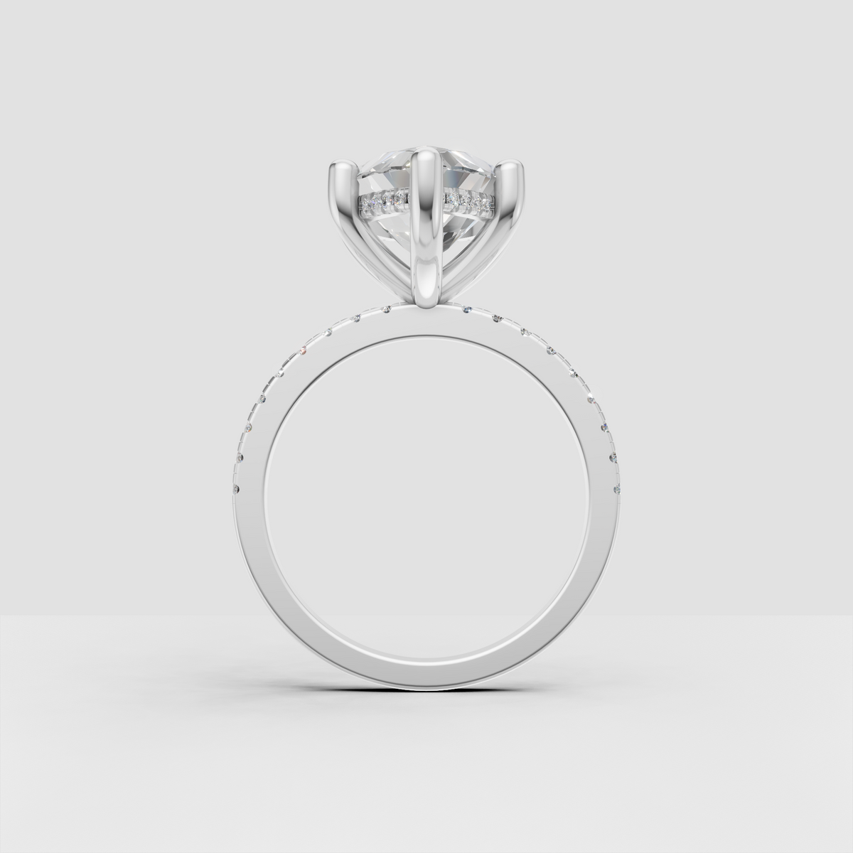 Marquise cut engagement ring with polished gold band