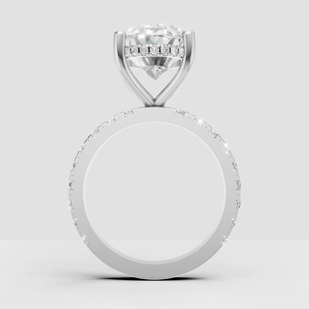 Oval diamond bridal ring with intricate hidden halo detail