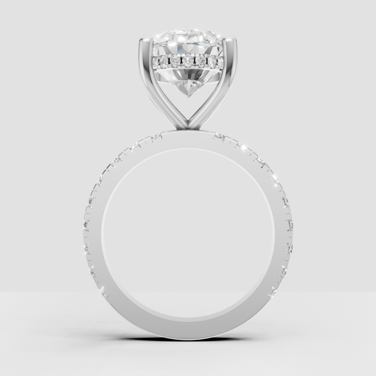 Oval diamond bridal ring with intricate hidden halo detail