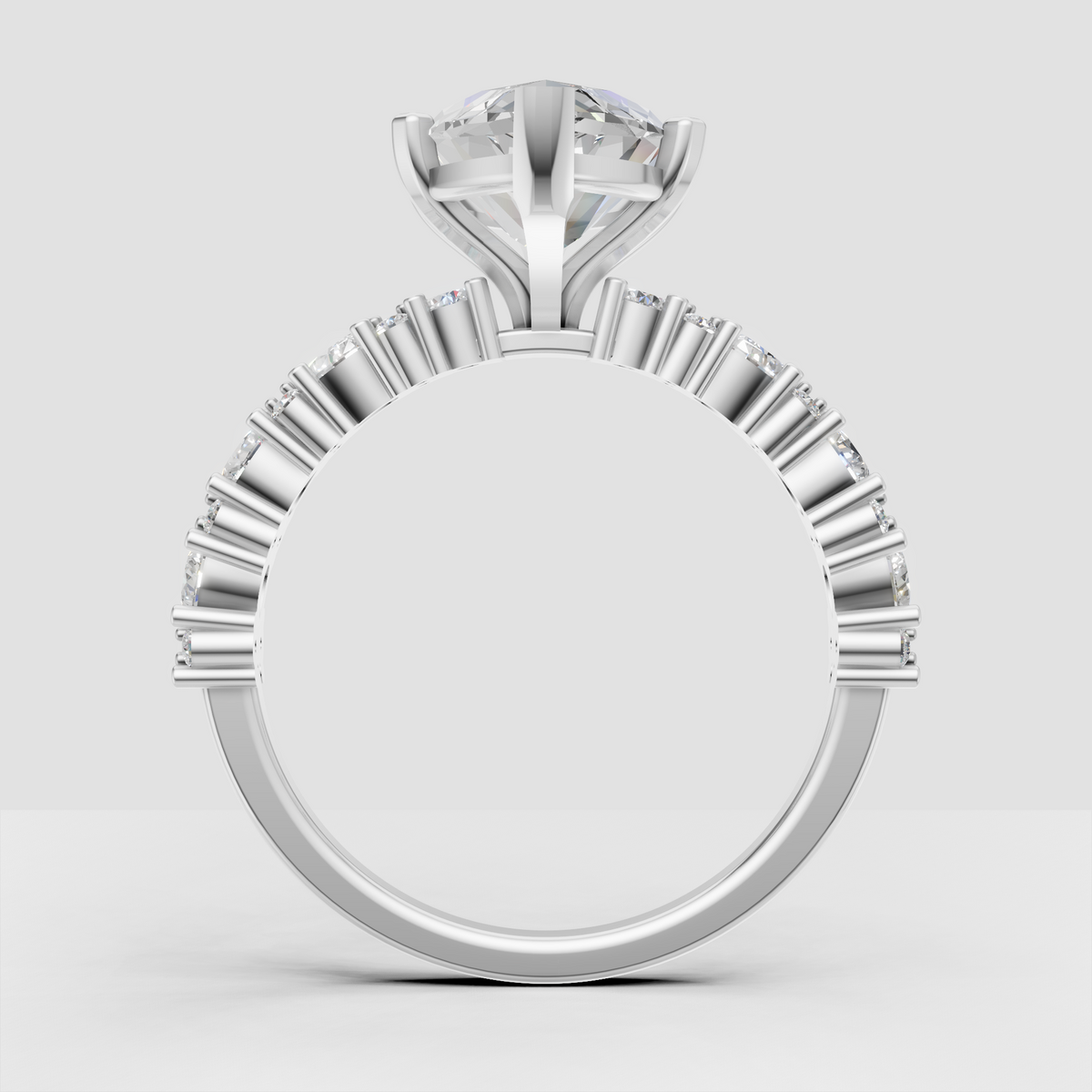 Yellow gold marquise ring with diamond shoulders