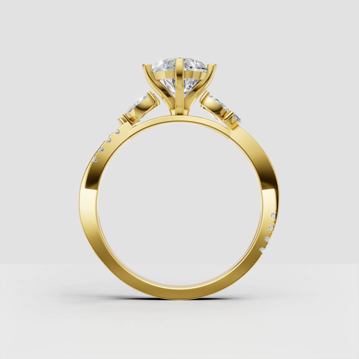 Pear cut canter diamond with four-prong setting and marquise halo
