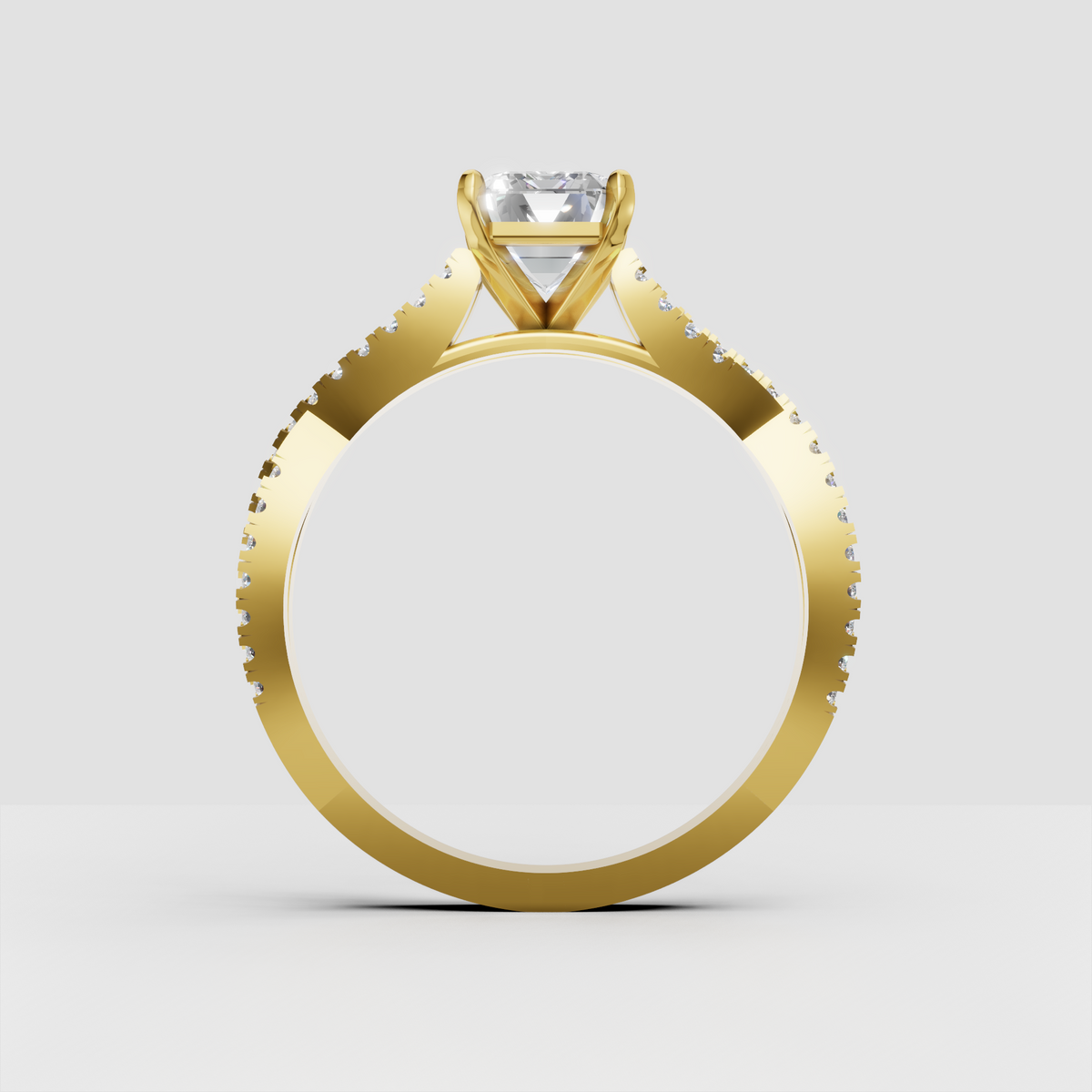 Yellow gold engagement ring featuring elongated emerald cut diamond