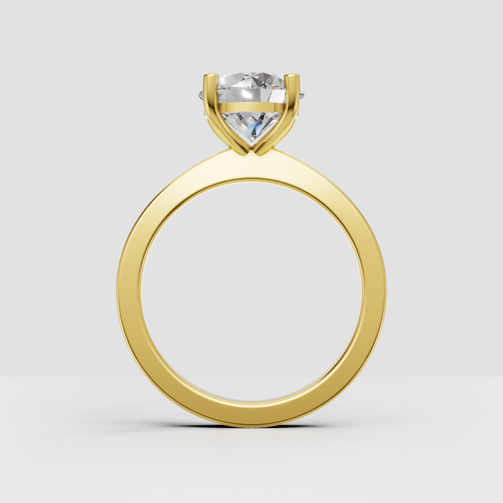 Four-prong round diamond ring with basket-style gallery