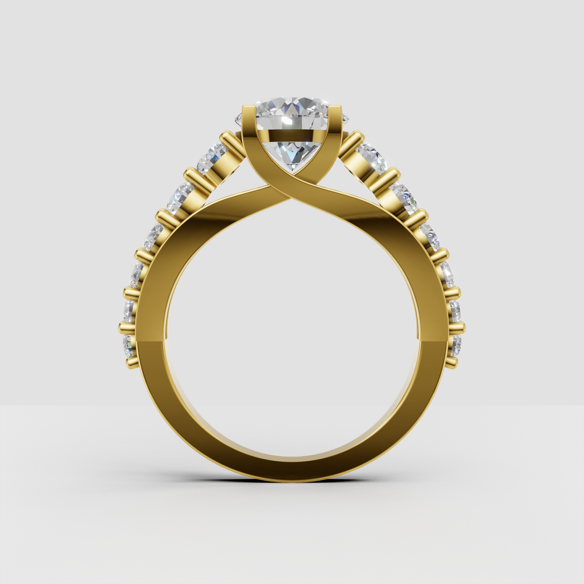 Round diamond ring with multiple round accent stones on shoulders