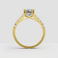 Yellow gold cushion engagement ring with sparkling side diamonds
