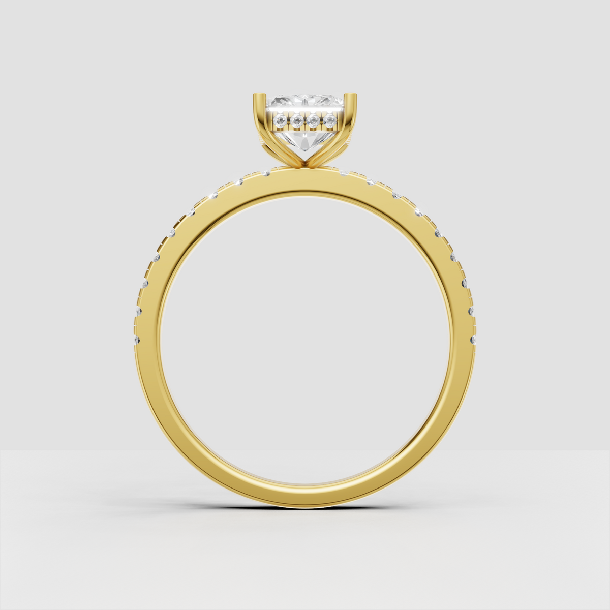 Radiant cut engagement ring with sparkling round accents