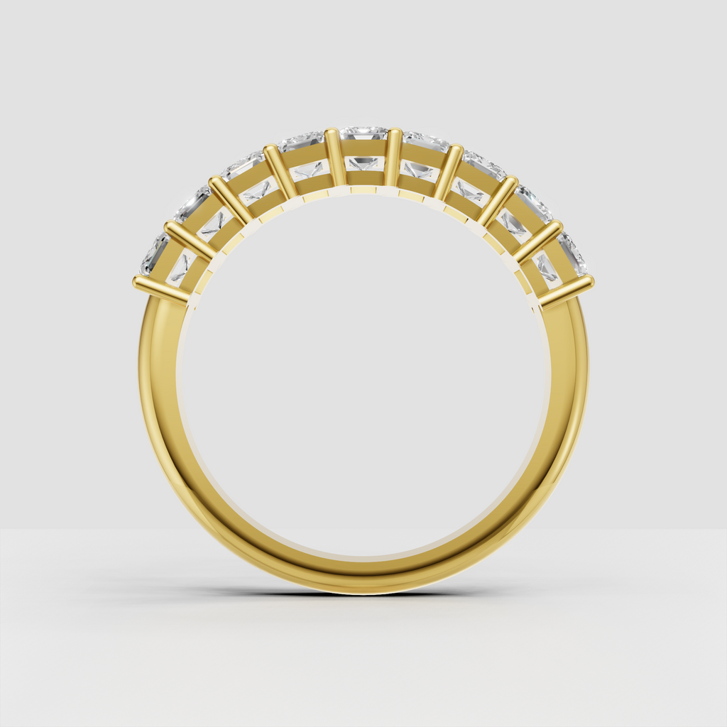 Luxury emerald cut diamond band ring in yellow gold