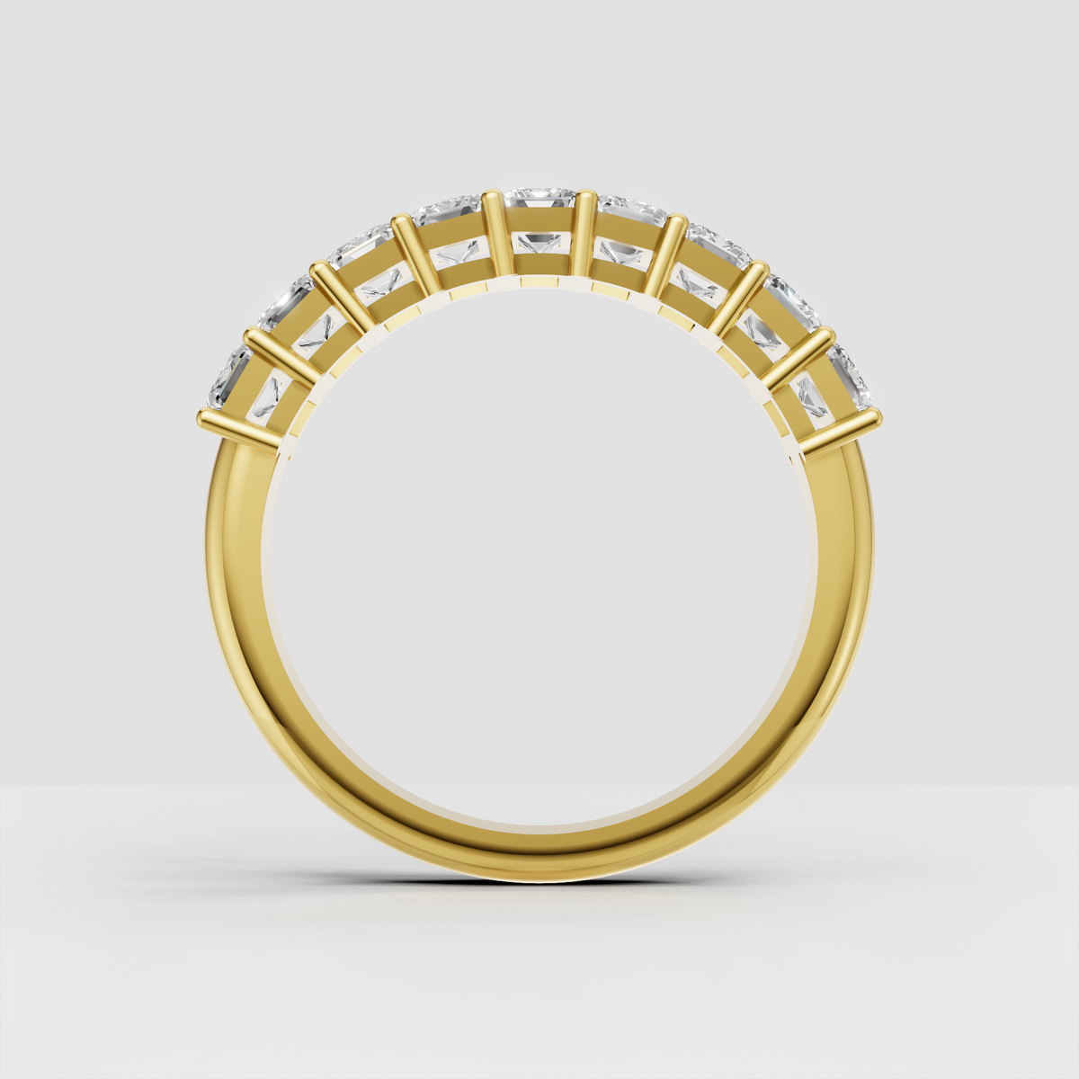 Luxury emerald cut diamond band ring in yellow gold