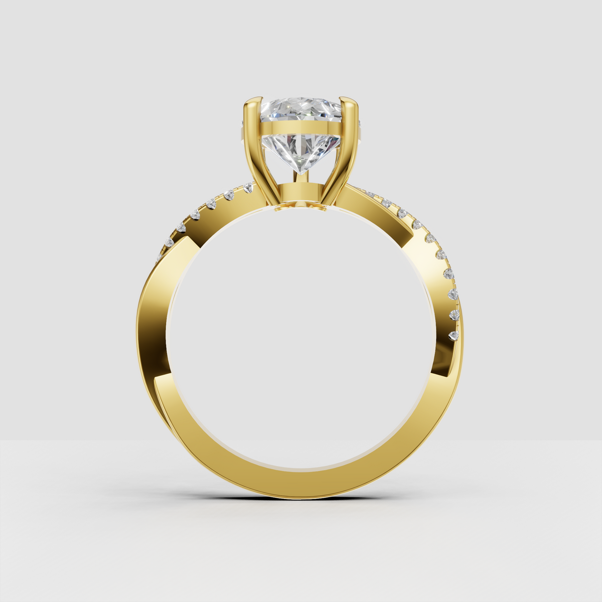 Pear shaped diamond ring with twisted pavé shoulders