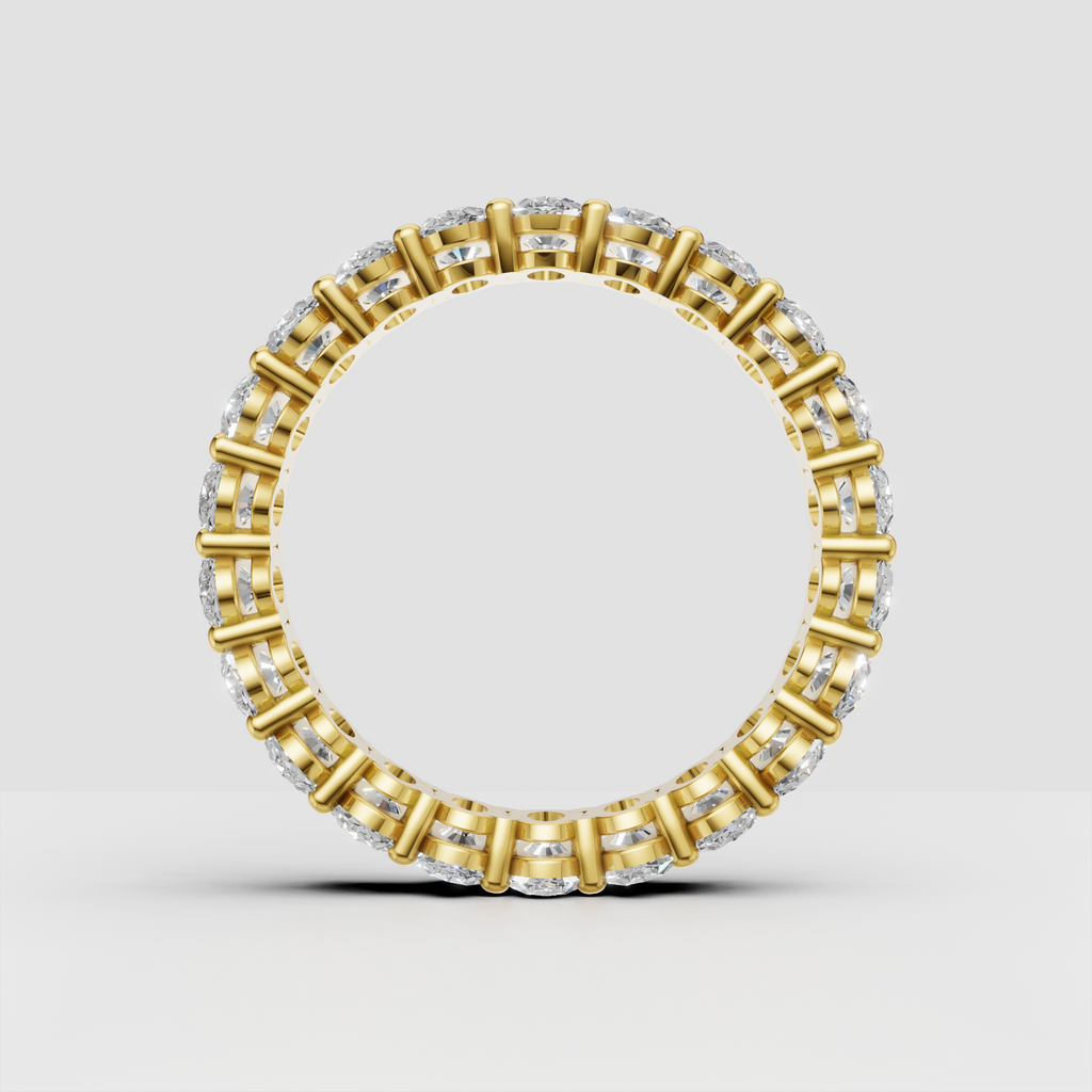 Oval diamond wedding band with shared prong setting