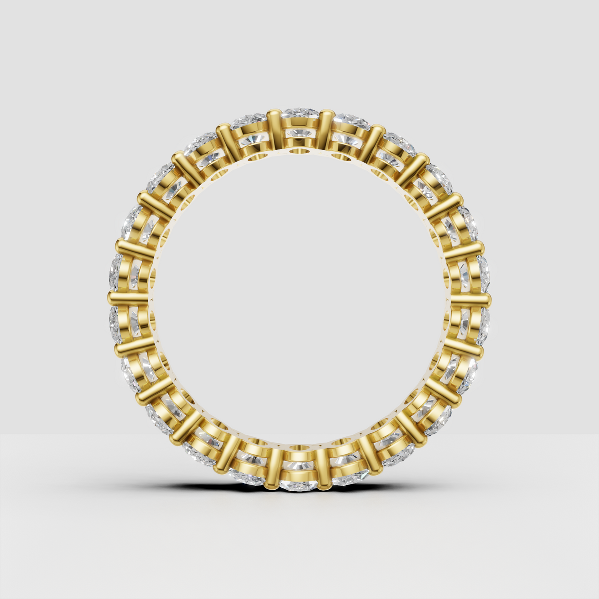 Oval diamond wedding band with shared prong setting