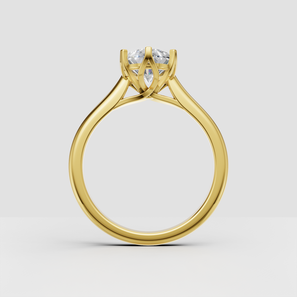 Elegant pear diamond solitaire ring with cathedral shoulders