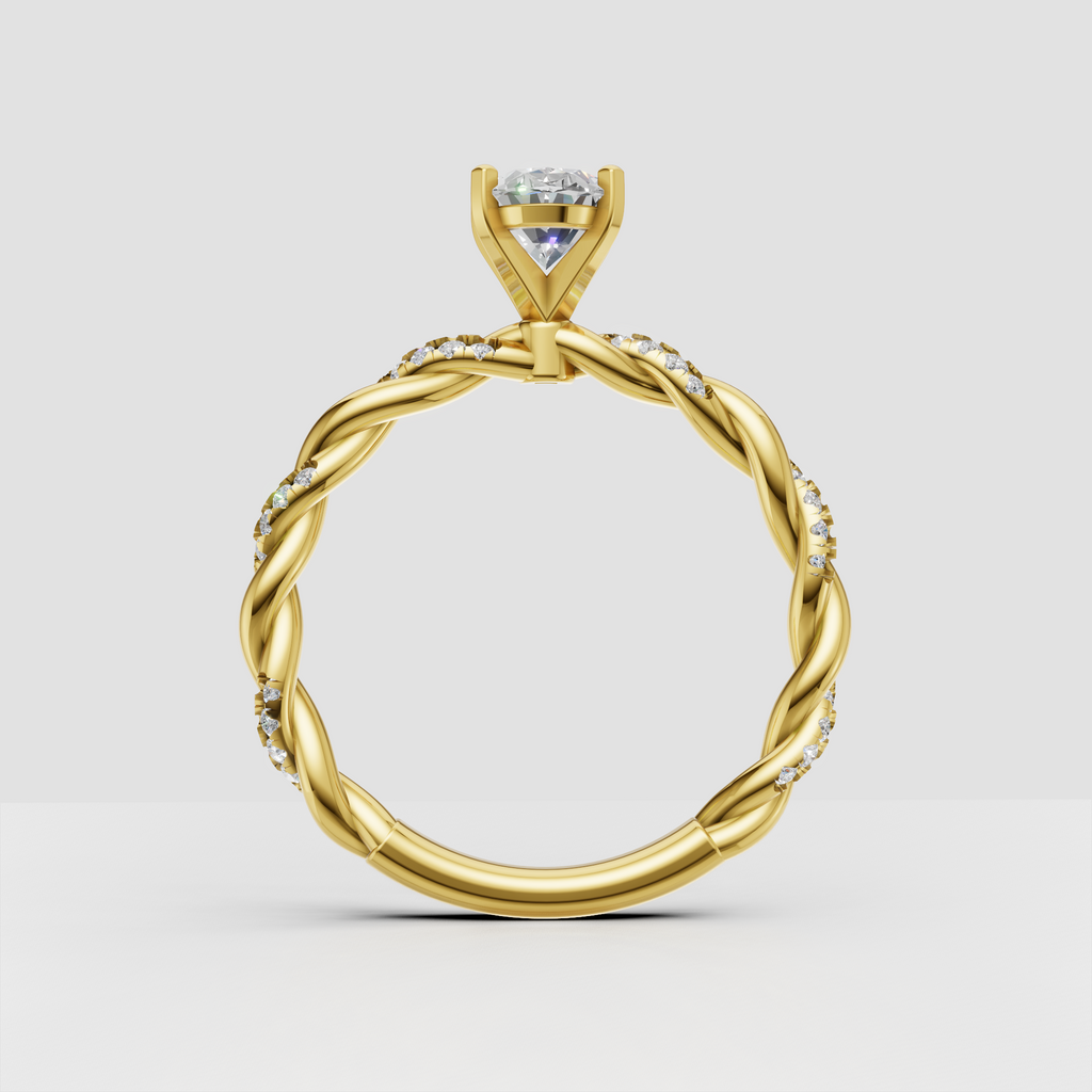 Twisted yellow gold oval diamond engagement ring