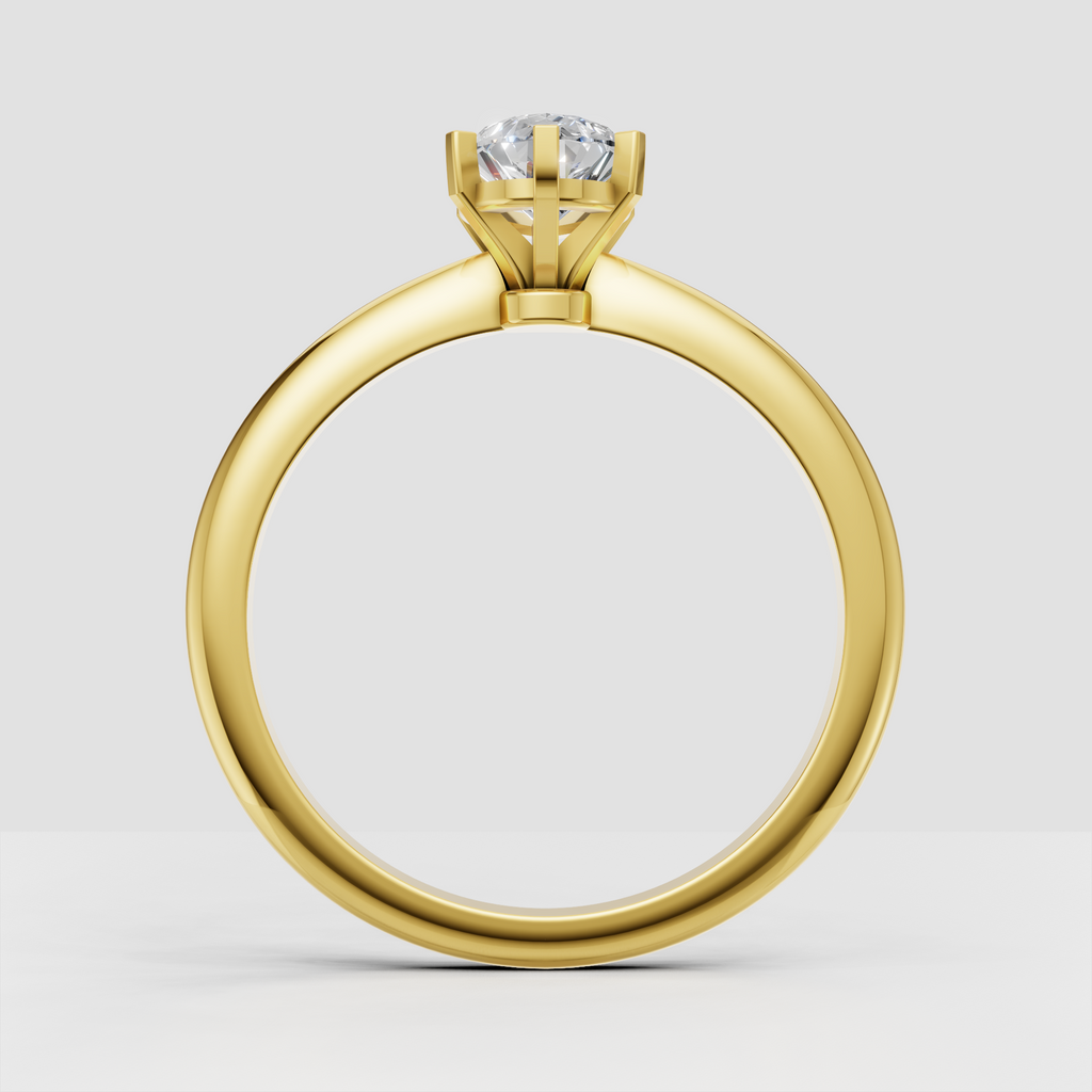 Yellow gold pear diamond ring with six prong setting