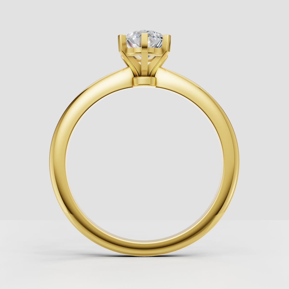 Yellow gold pear diamond ring with six prong setting