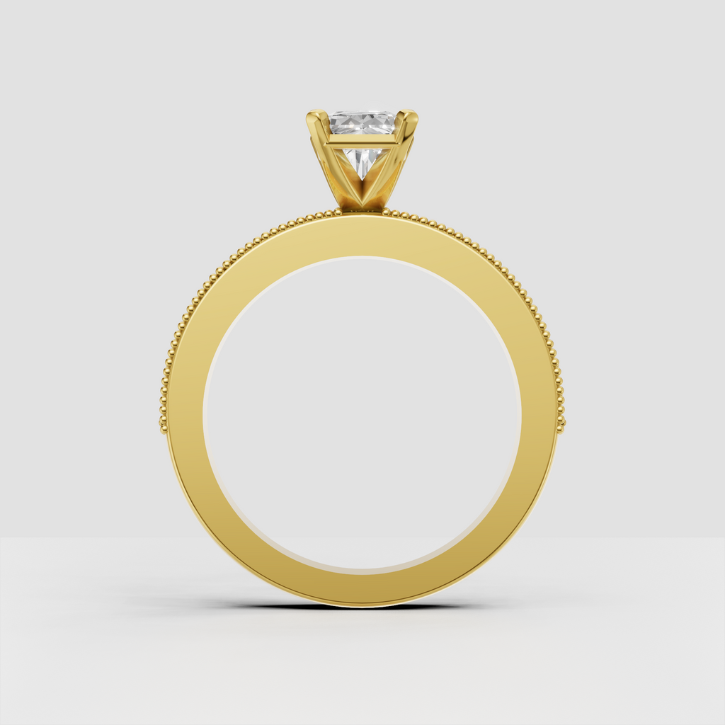 Radiant cut center diamond ring with four-prong claw setting and beaded milgrain edges