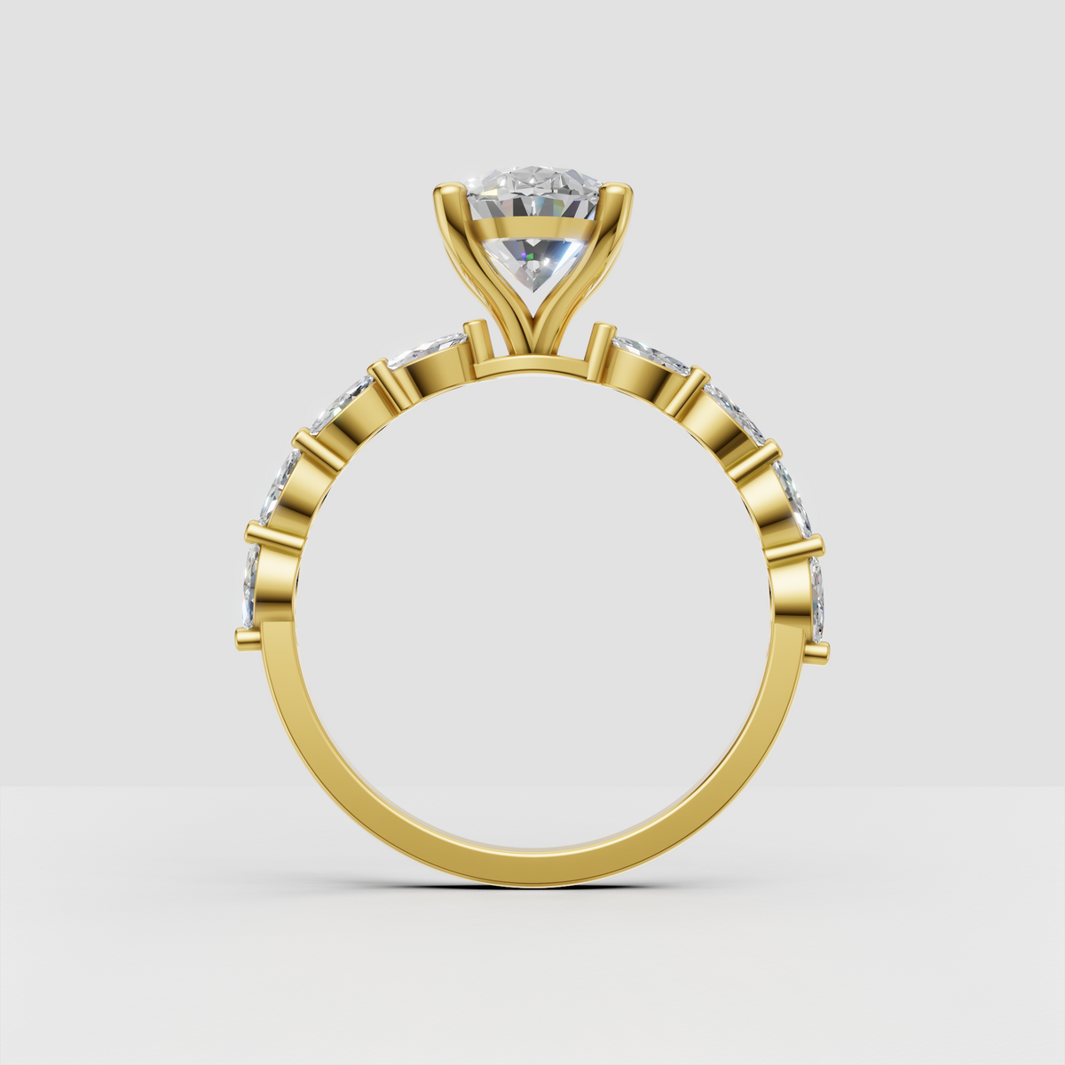 Yellow gold oval diamond engagement ring with sparkling side stones