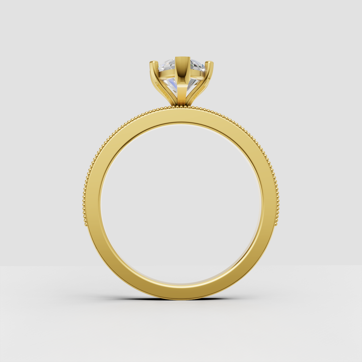 Yellow gold marquise diamond engagement ring with sparkling pavé shoulders