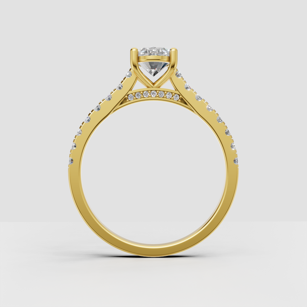 Yellow gold oval diamond ring with diamond shoulders