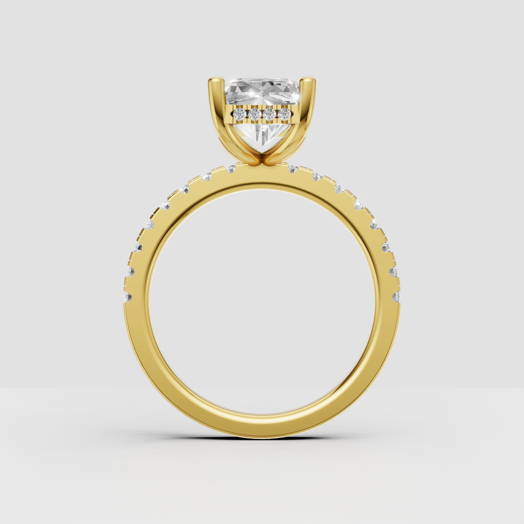 Radiant diamond ring featuring a slim pavé set rose gold band