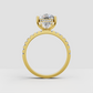 Pear cut engagement ring with hidden halo setting