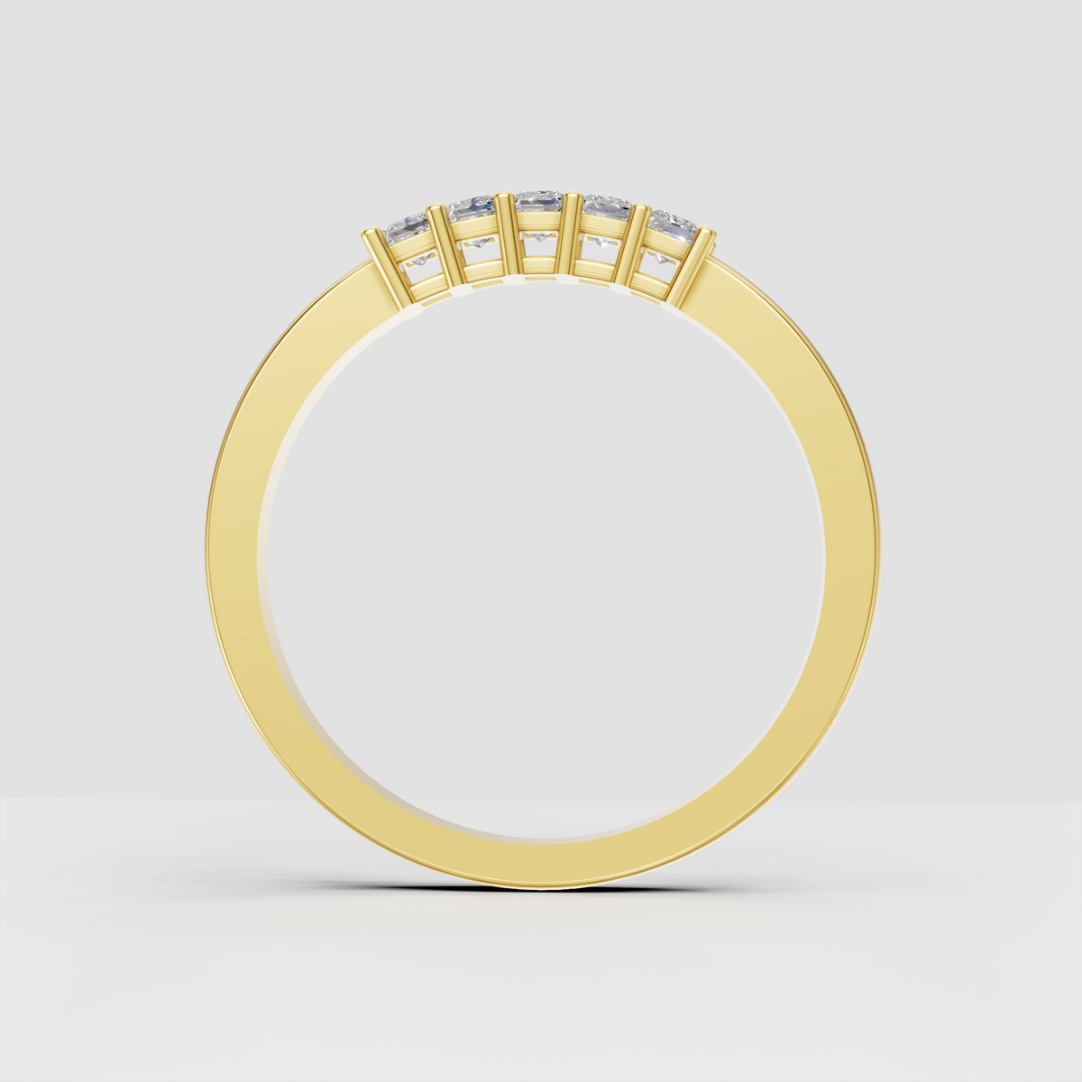 Modern five-stone diamond ring with princess cut stones and polished gold band