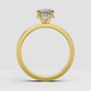 Elegant oval diamond engagement ring with polished gold band