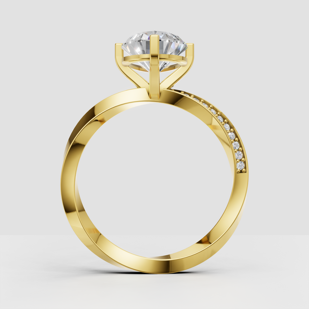 Yellow gold pear diamond engagement ring