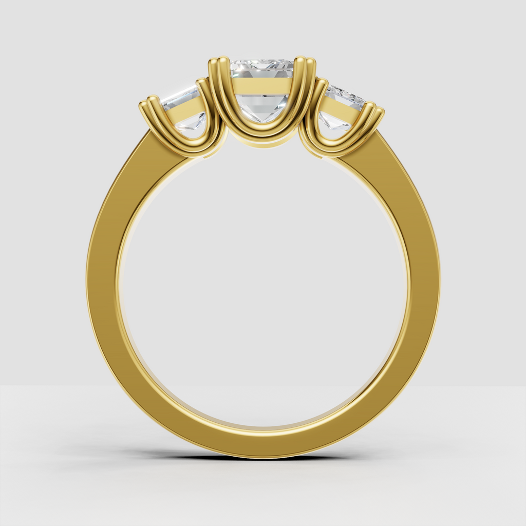 Elegant emerald cut three stone engagement ring