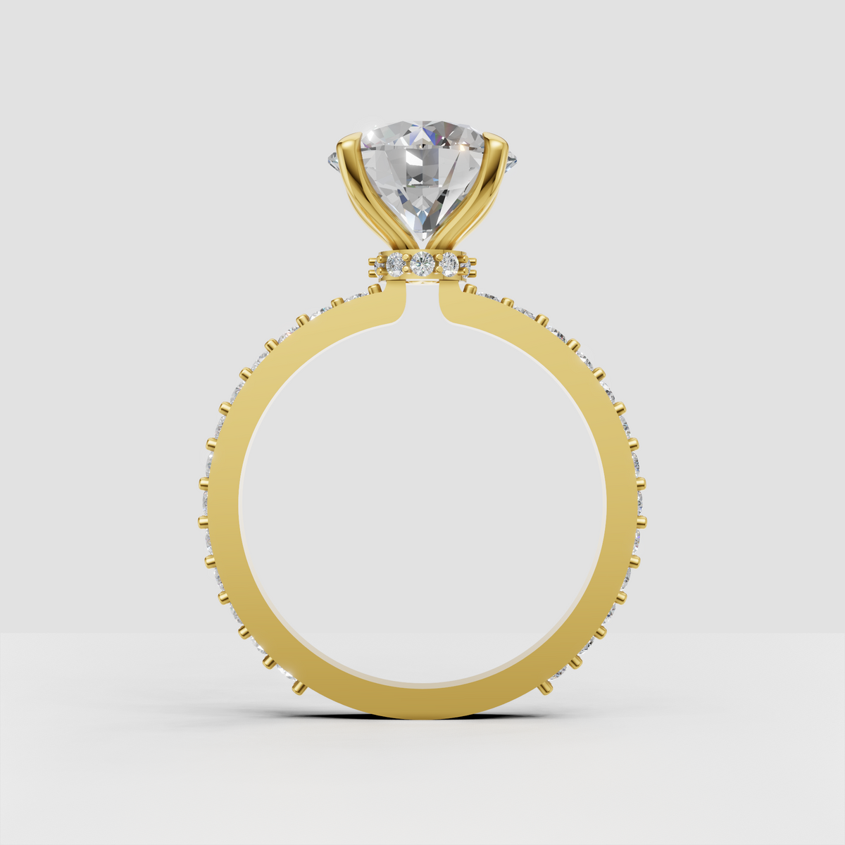 Elegant round diamond ring with concealed halo and yellow gold band