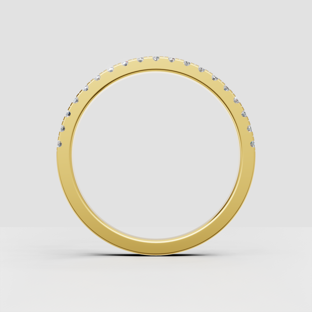 Round diamond channel set band with smooth polished gold finish
