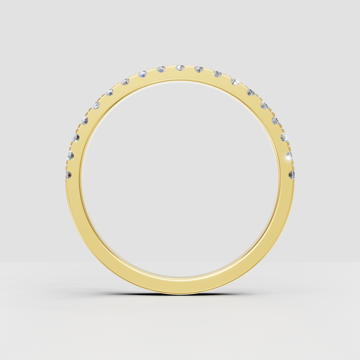 Round brilliant diamond half eternity band viewed from the front