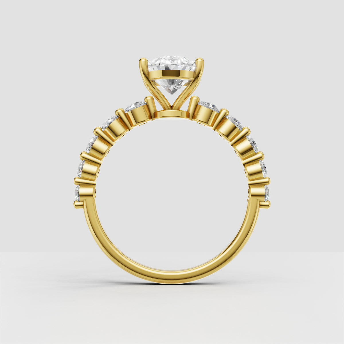 Oval diamond cathedral setting engagement ring viewed from the front