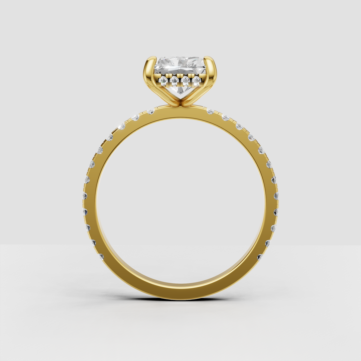 Modern radiant diamond solitaire ring with sparkling shoulder stones