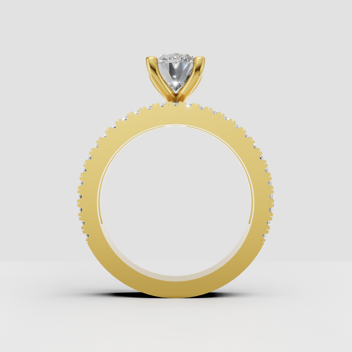 Four-prong oval diamond solitaire engagement ring with detailed three-row stone-set band