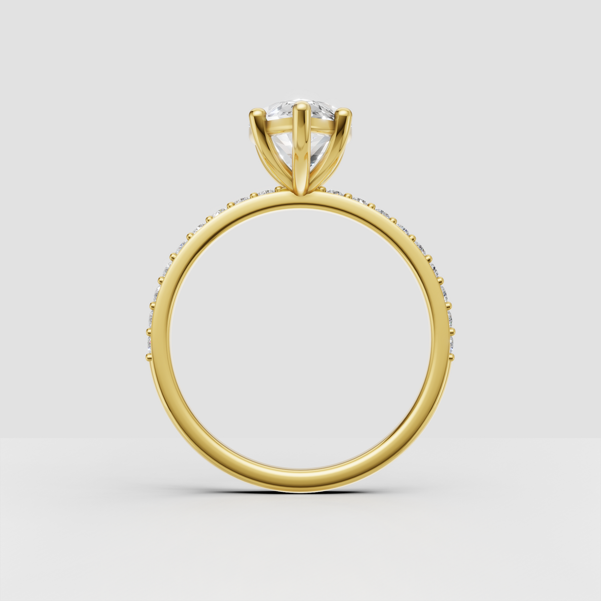 Marquise center stone engagement ring with continuous pavé diamond band