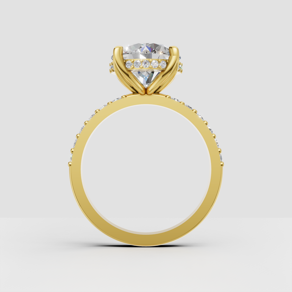 Round center stone ring with four sculpted prongs