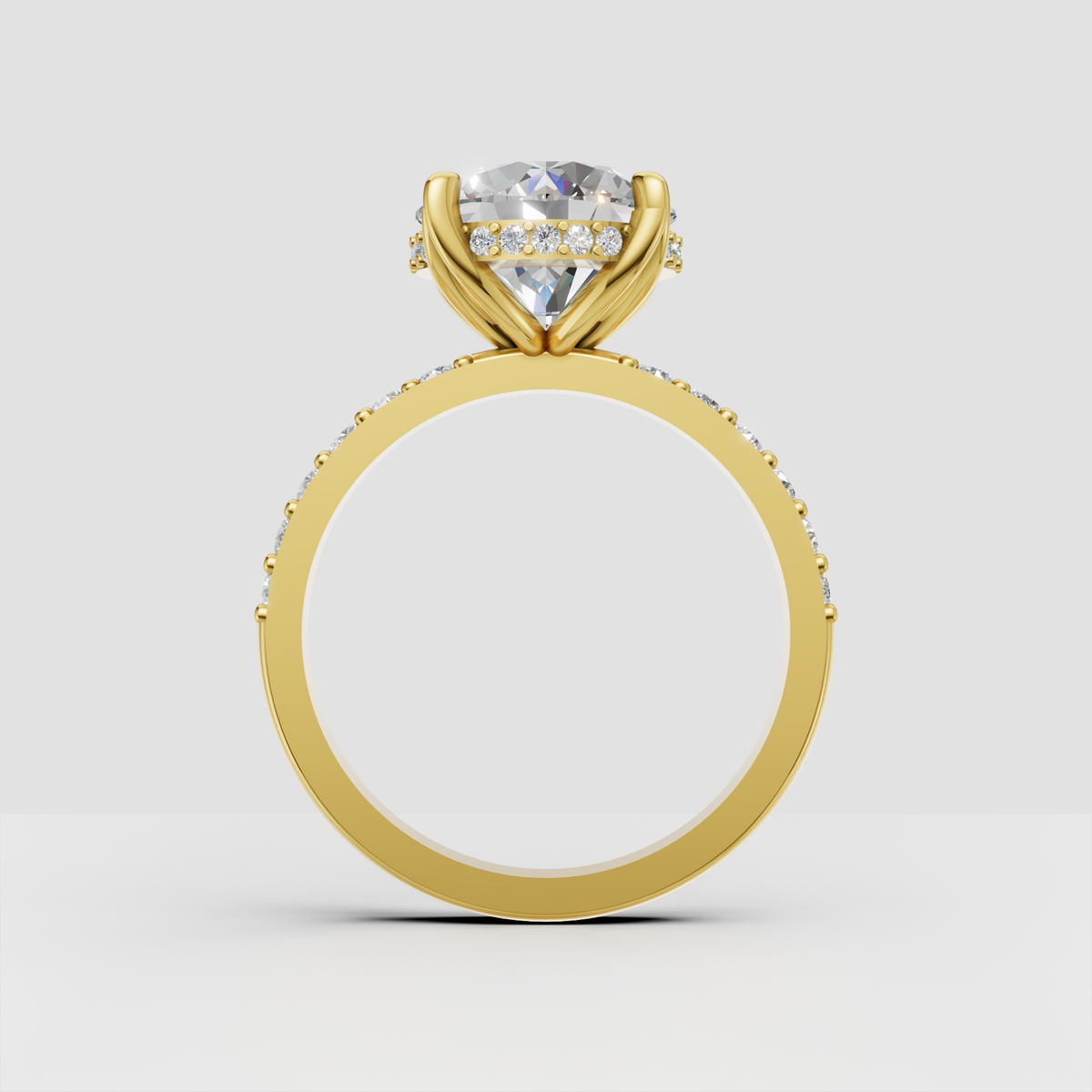 Round center stone ring with four sculpted prongs