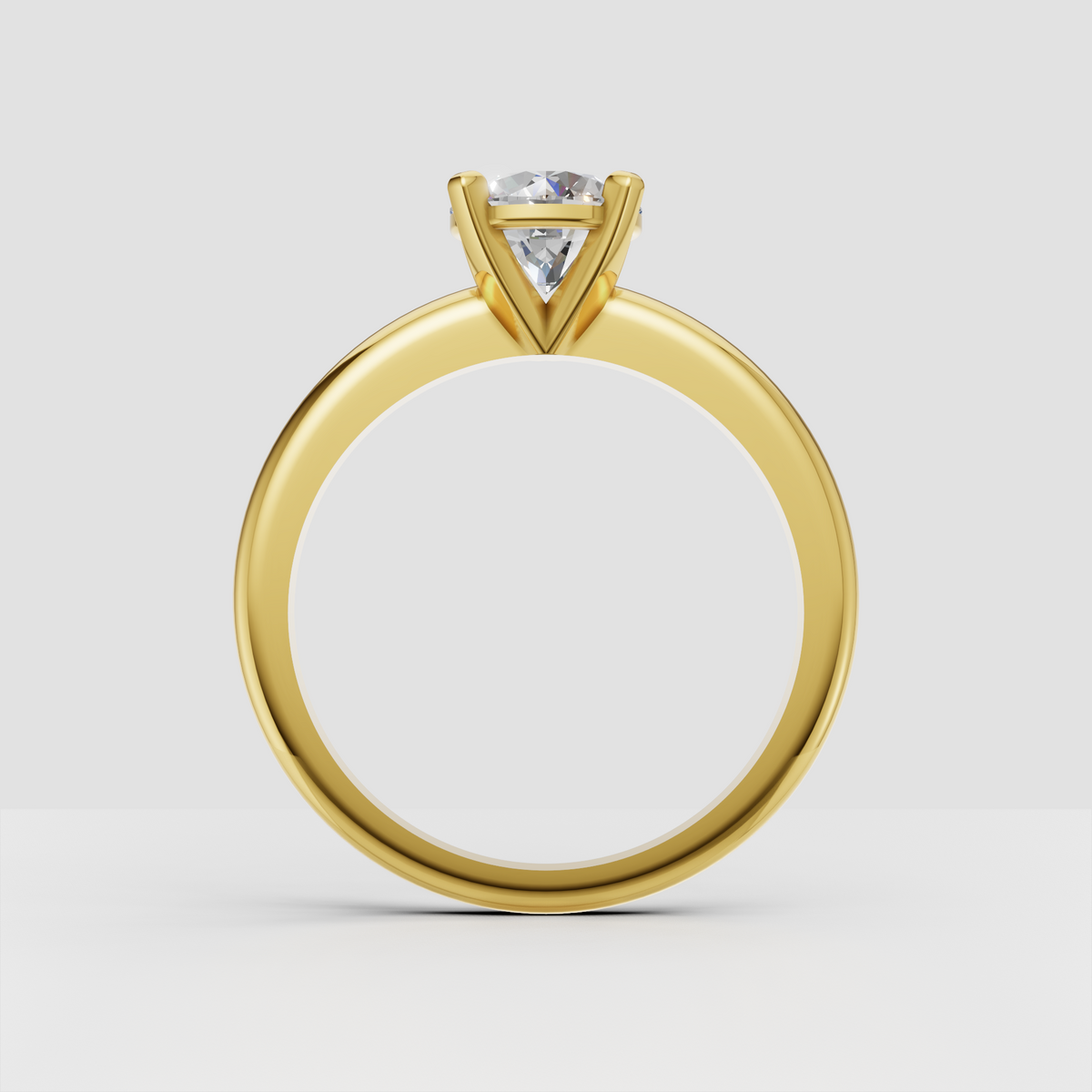 Elegant round diamond solitaire ring with polished gold band