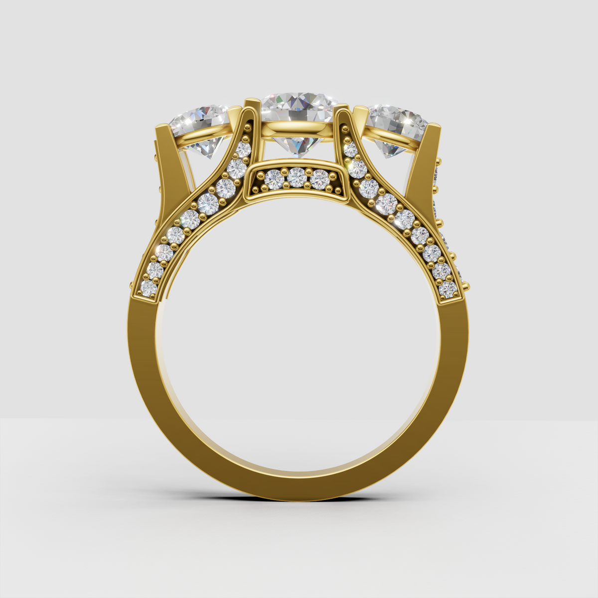 Round brilliant Diamond trilogy ring featuring a sculpted trellis setting