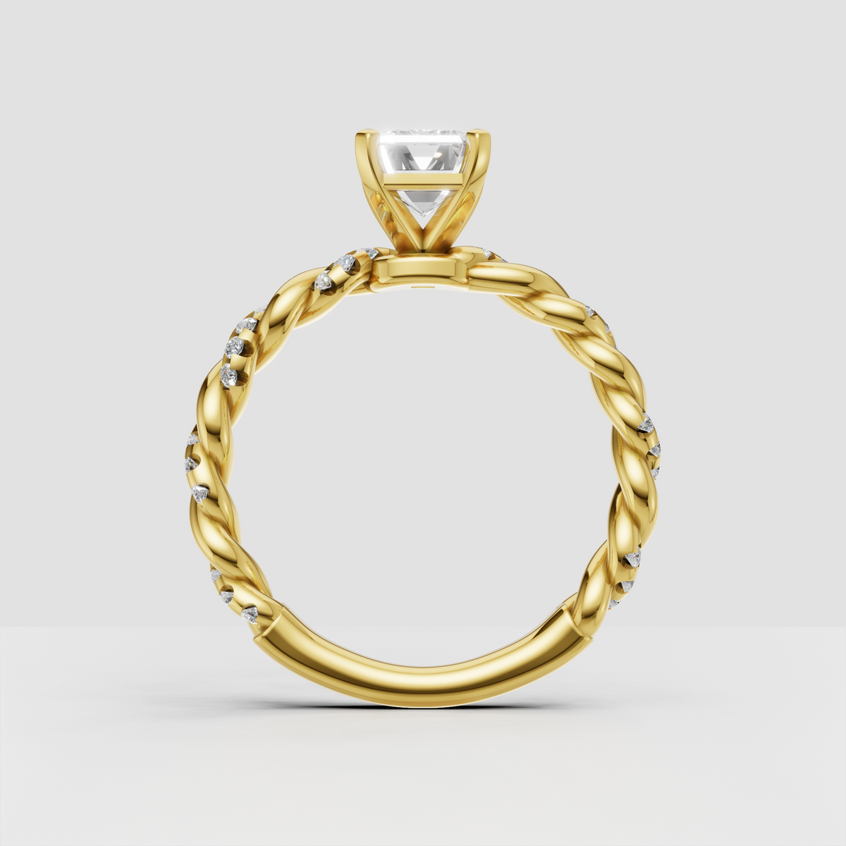 Twisted band emerald cut diamond bridal ring
