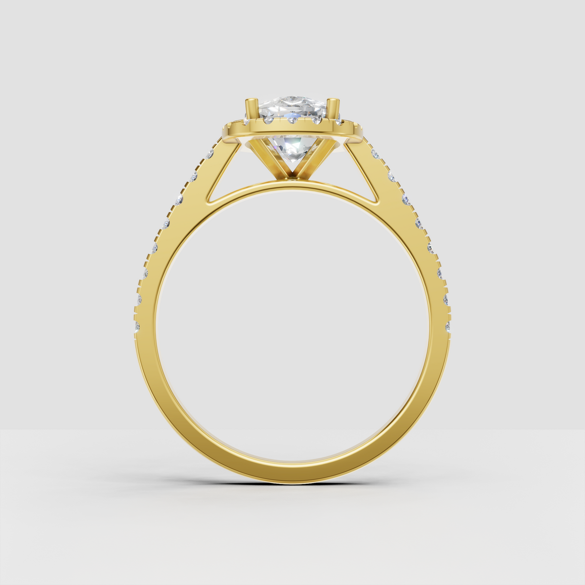 Cushion cut diamond halo engagement ring featuring a pavé cathedral ring