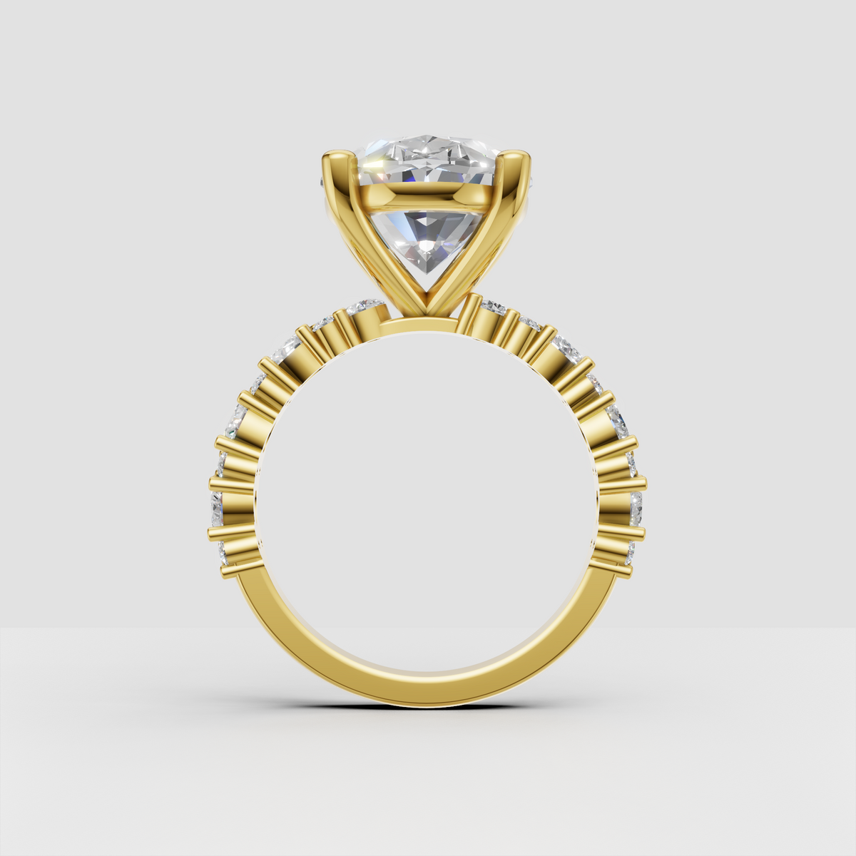 Oval center diamond ring with pear-shaped and round diamond accents