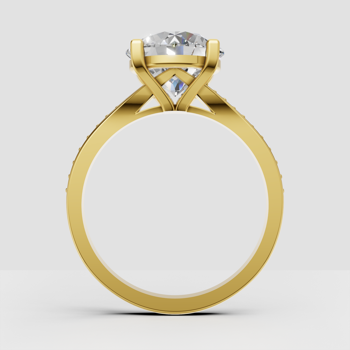 Round diamond ring featuring a four-prong cathedral setting